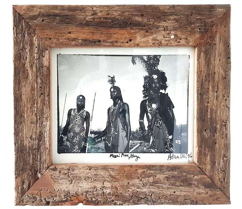 Black and White photograph of Maasai Morans in the Mara